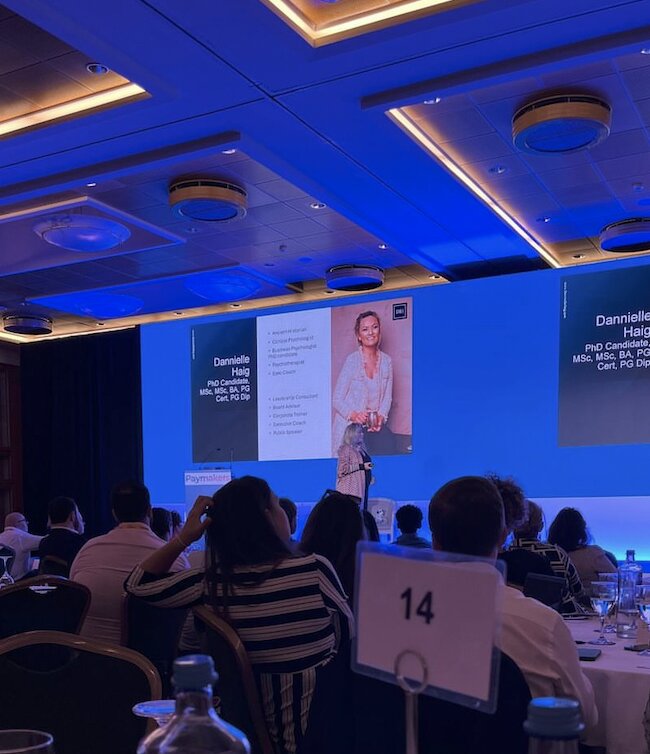 Dannielle Haig speaking at the Paymakers ballroom event